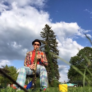 Cranky playing his straight alto saxophone