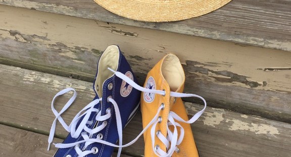 Straw Boater and Chuck Taylor Hi-tops.