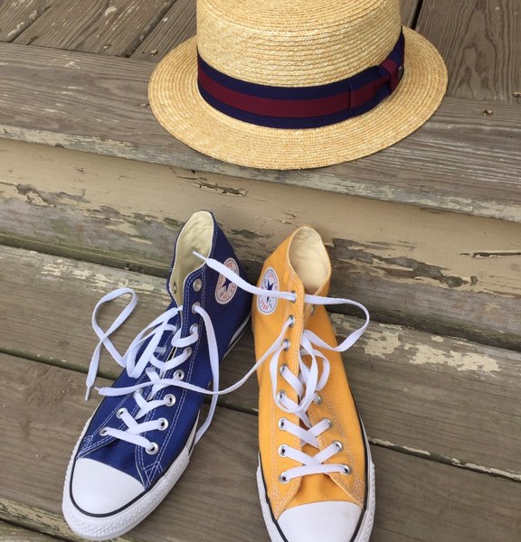 Straw Boater and Chuck Taylor Hi-tops.